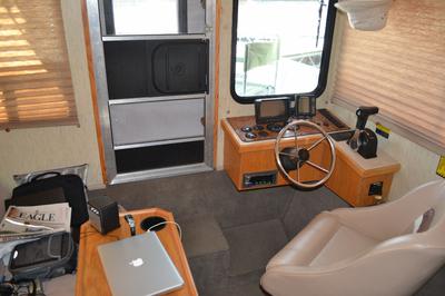 Interior helm view of Nomad houseboat