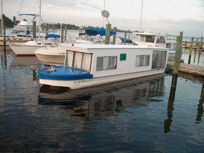 Towing a large trailerable towable houseboat.