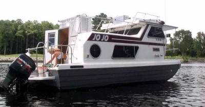 A clean rebuilt Steury Houseboat 