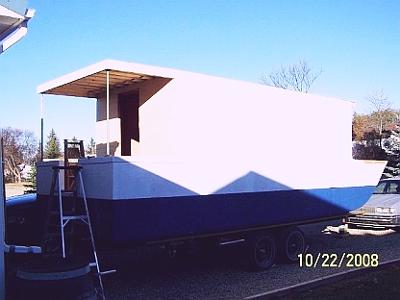 woodworker builds the perfect tiny houseboat