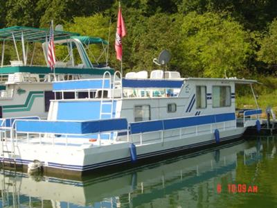 A new radio on a 1976 Stardust Cruiser houseboat.