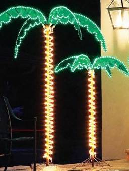 Decorative lighting and palm trees on houseboats
