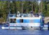 Our 1965, 46 foot, Boatel houseboat, with aluminum siding.