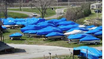 Winterizing a houseboat for winter storage.