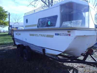 Our 1973, 20 foot, trailerable Solitaire houseboat.