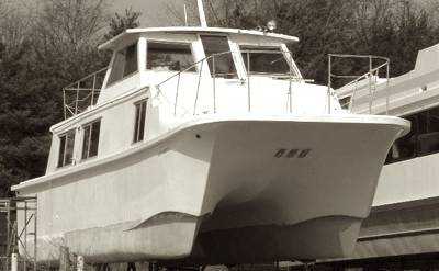 A catamaran Carri-Craft houseboat is a unique design.