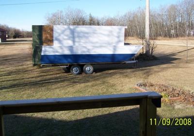 The building of a trailerable Bayou Belle houseboat.