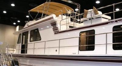 Buying a big houseboat to live on
