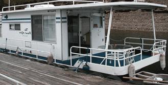 A typical older Steel Hull Sumerset Houseboat
