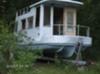 Any ideas as to who built these trailerable houseboats?