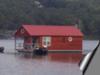 Who makes floating pontoon style cabin houseboats?