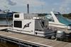 Port view of a trailerable Nomad houseboat