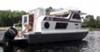A clean rebuilt Steury Houseboat 