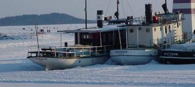 Winter Houseboat Water - boats freezing in frozen lakes.