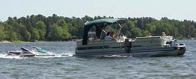 Your houseboat can tow 1, 2, 3, or 4 pwc, jet-ski's easily.